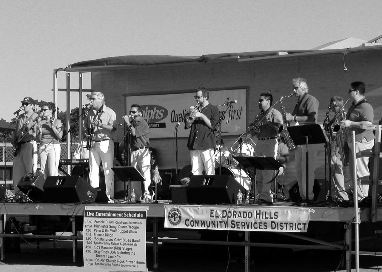 Band at the celebration (2002, by the creators)