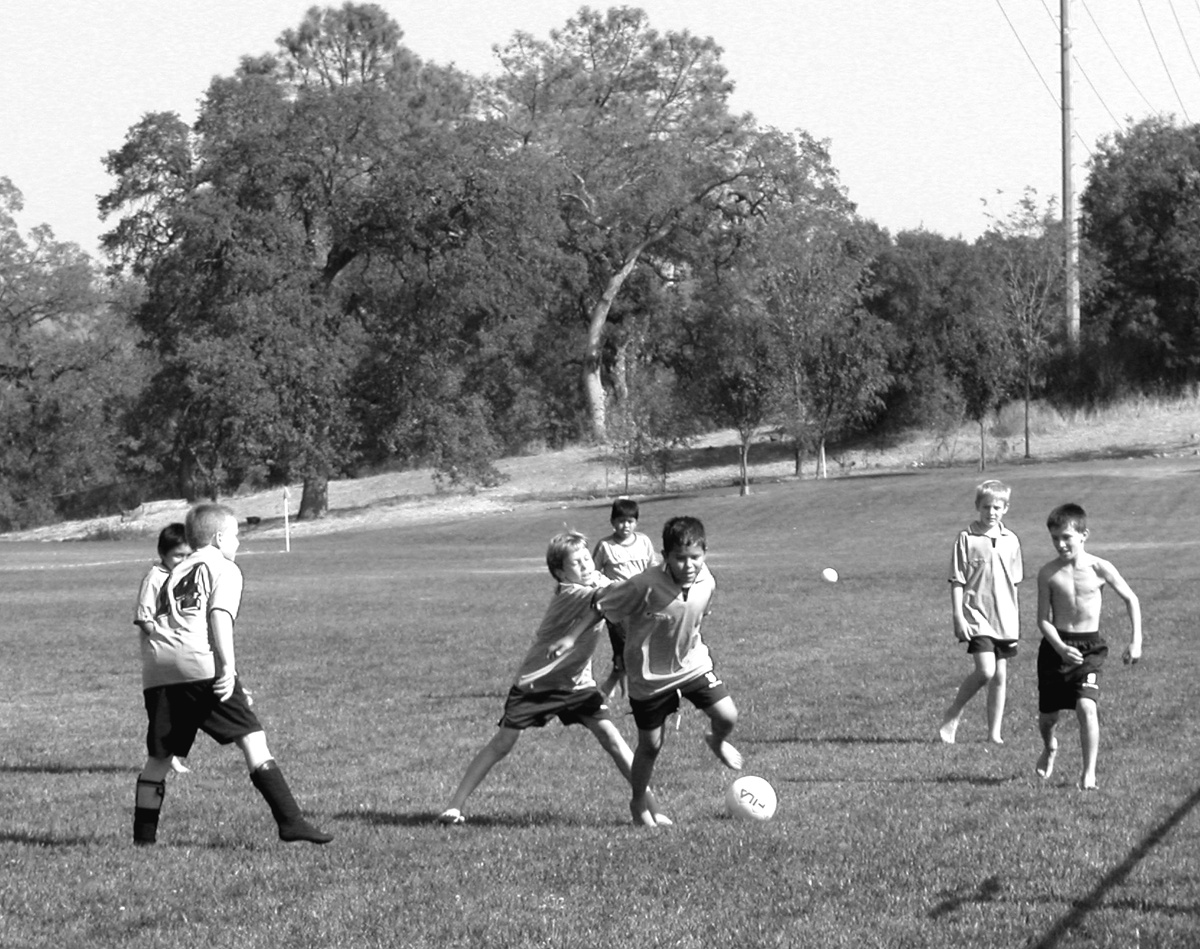 Soccer players at Christa McAuliffe Park in Cameron Park (2003, by the creators)