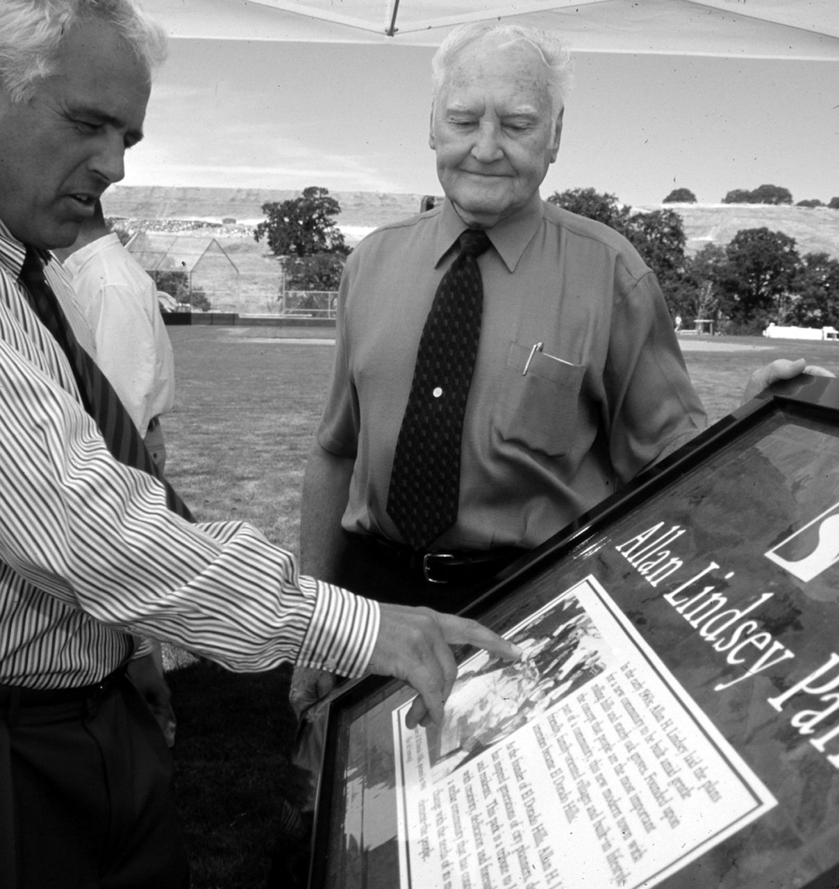 Bill Parker and Allan Lindsey at the Allan Lindsey park dedication (2003, courtesy of Serrano/Parker, by Tom Myers)